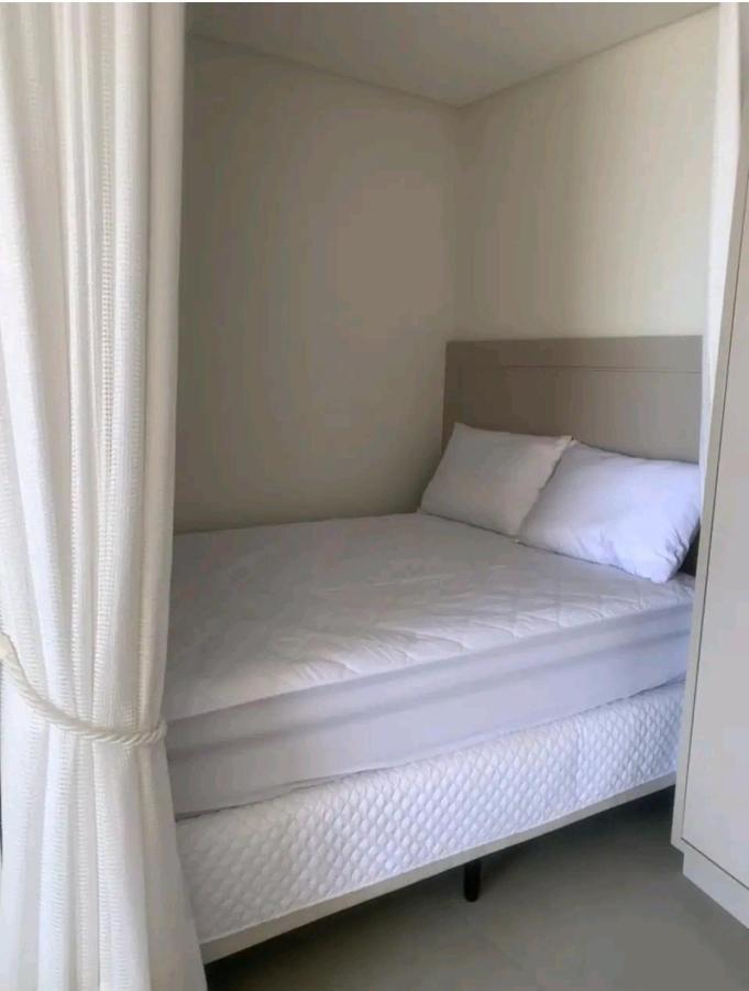 Loft 221 Apart Hotel Farol De Santa Marta Laguna Bagian luar foto